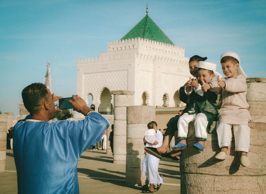 Family enjoying camel ride in Morocco's Sahara Desert