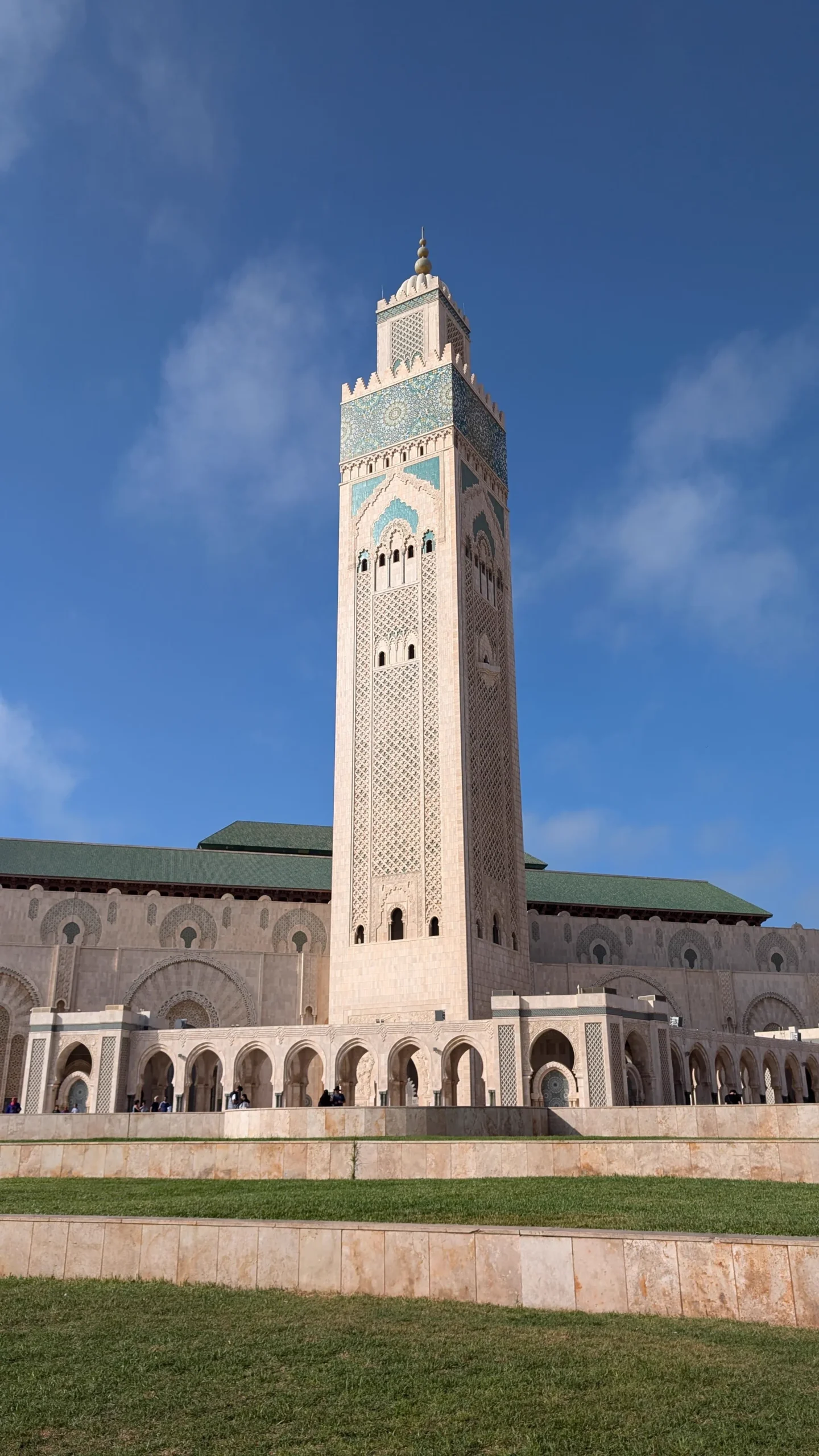 Hassan II Mosque tower against a blue sky in Casablanca