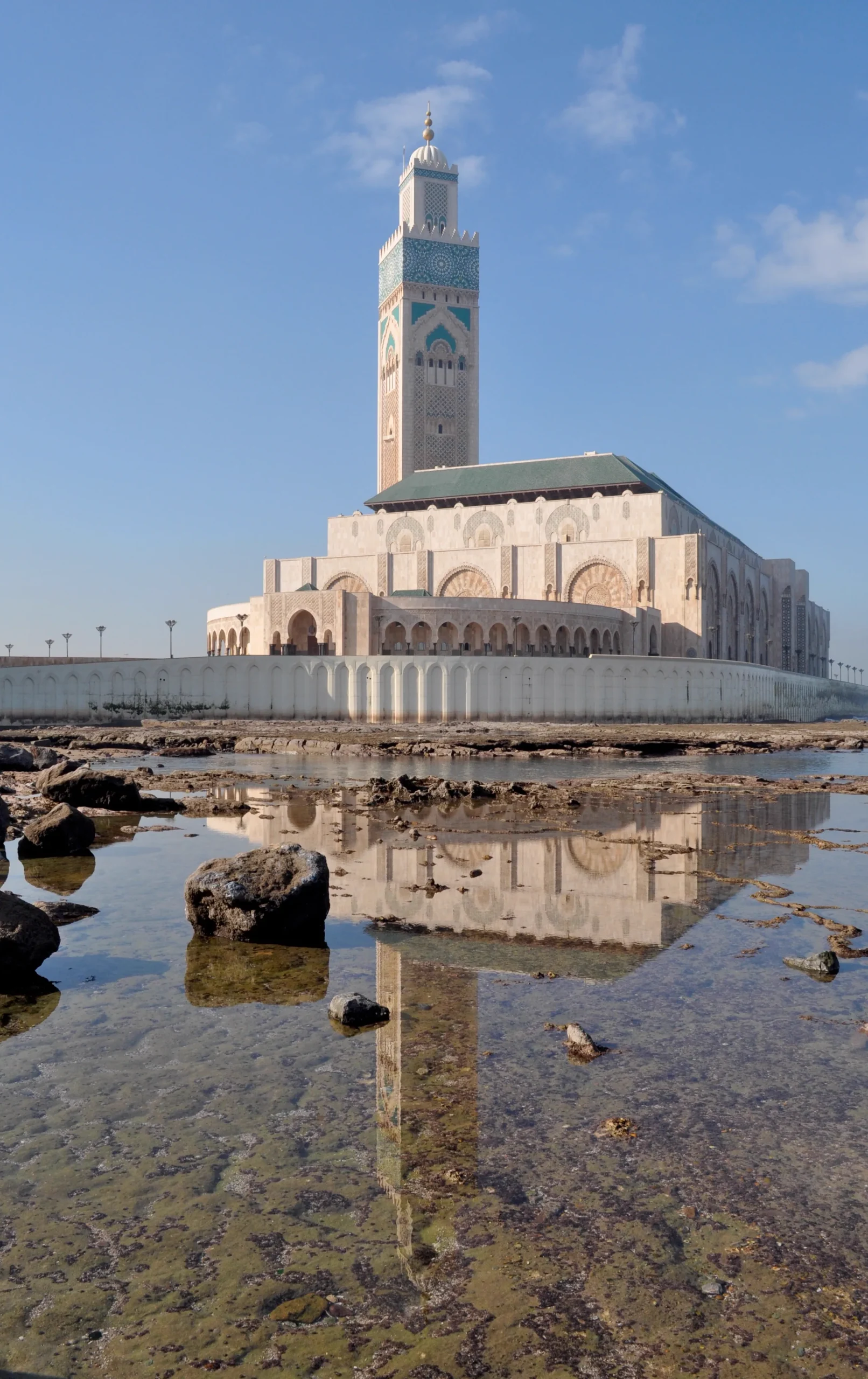 Hassan II Mosque reflected in tidal pools in Casablanca